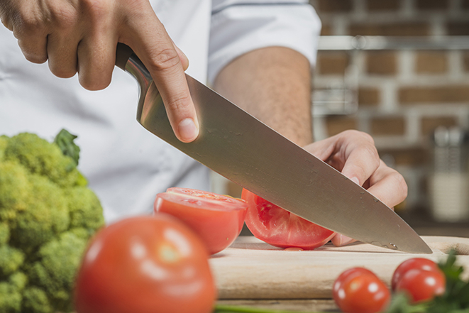 Chef S Male Hand Cutting Tomato With Sharp Knife Board Smll
